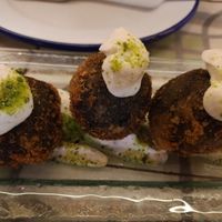 Entrante: croquetas "en su tinta" (sirven 6 uds.) at VEGA - Alamo in Madrid
