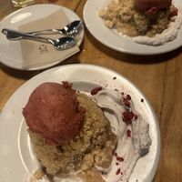 Pear and blueberry crumble with blackberry icecream and ginger cream  at VEGA - Alamo in Madrid