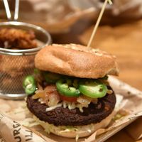 Black Bean Burger with fried pickles at Burger Village in San Luis Obispo
