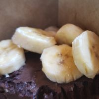Chocolate cheesecake (or what's left) with bananas at How Delish HD in West Orange