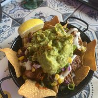 Corn chips with guacamole and pulled jackfruit   at Hecho en Mexico in South Yarra