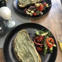 Avocado and hummus toast with grilled veggies. They updated the old avo toast a bit. at Na Golfu in Celje