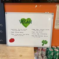 Updated menu with a tasty impossible burrito. Pretty stoked that this place had options😄 at Lola's Taqueria in Belvedere