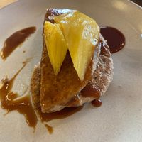 Vegan pancakes made of oats and bananas. You can make your own, this is w/ mango and caramel. at Camélia in Porto