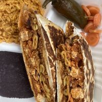Buffalo “chicken” Crunchwrap   at Nuno's Tacos & Vegmex Grill in Dallas