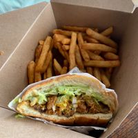 Fajita torta with fries  at Nuno's Tacos & Vegmex Grill in Dallas