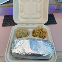 Vegan big Texas burrito with Mac n cheese and potato saladd  at Nuno's Tacos & Vegmex Grill in Dallas