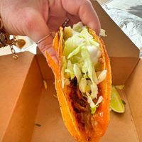 Hard taco with cheese, lettuce & SC  at Nuno's Tacos & Vegmex Grill in Dallas