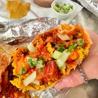 Needs crunch. Added lettuce and onions myself    at Nuno's Tacos & Vegmex Grill in Dallas