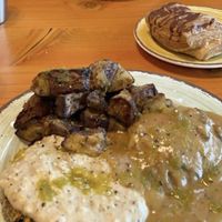 biscuits and gravy with taters and then a chocolate croissant.  at The Park Side Cafe in Olympia