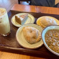 Zucchini corn soup, hand pies, chocolate peanut butter pie, and a latte special with pistachio    at The Park Side Cafe in Olympia