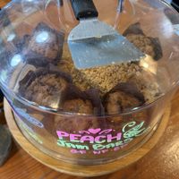 Bought a peach crumble bar to go.😋  at The Park Side Cafe in Olympia