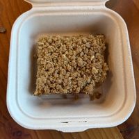Peach oat crumble bar to go. Yumm!  at The Park Side Cafe in Olympia