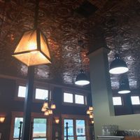 Unique ceiling and pretty lighting at The Park Side Cafe in Olympia