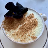 Sunshine turmerric latte with homemade oat milk at Eden in Bondi Beach