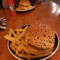 The make your own vegan burger; sourdough bun, vegan chicken patty, hashbrown and salad with fries. at Triple Point Brewery & Bar in Sheffield