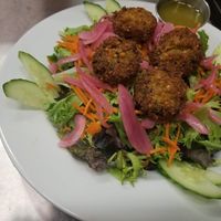Salad topped with house made falafel at Sip in Plattsburgh
