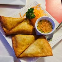 Golden triangle puffs with cucumber sauce  at Wish Thai Kitchen in Watertown