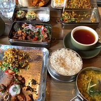 Very delicious vegan dishes, two of them also gluten-free (fenugreek potatoes & green ginger curry)  at Mowgli in Cardiff