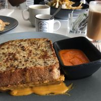 Grilled cheese and cappuccino for breakfast  at Vegan Inc in Puebla