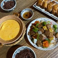 Coconut chickpea Curry, Tempeh and Peppers, Fried Spring Rolls and Rice at Ngon Vegan Restaurant in Tam Coc