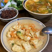 Peanut & Ginger Tofu, Sweet & Sour Soup, Steam Veggies w/ dipping sauce, and brown rice   at Ngon Vegan Restaurant in Tam Coc