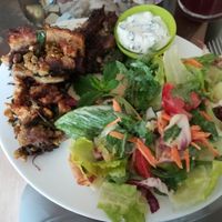 Kartoffelgratin mit Salat. Sehr lecker! I already ate a bit of it, so it doesn't look perfect anymore :-) at Vinzenz in Weilheim