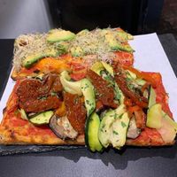 Delicious focaccia pizza  at Romana in Rome