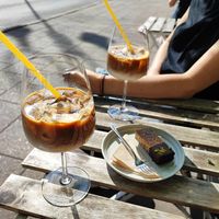 Vegan bar and iced latte with coconut milk at Italala Caffe in Vilnius