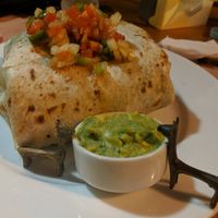 Veggie burrito w no cheese at Cannibal Cafe in Roatan