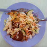 $5 Thai style Fish chop with rice: steamed rice, the ready chops, topped with Thai style chilli sauce from the bottle and some more tomato sauce. The salad with this dish is good,  at San De Vegetarian 三德 - Blk 256 Yishun in North Singapore