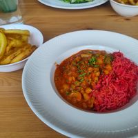Tasty Stroganoff with oily onion rings at Luna's Vegan Corner in Cardiff