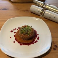 Vegetable Risotto Cake
Roasted Red Pepper, Smoked Aubergine Sauce,
Beetroot Glaze  at Luna's Vegan Corner in Cardiff
