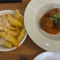 Truffle and parmesan chips and arancini (so good) at Luna's Vegan Corner in Cardiff