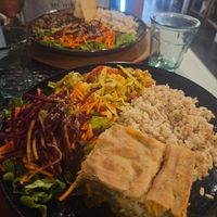 The large portion, brown rice, salad, vegetable pie. at Gosto Superior in Braga