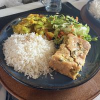 Vegan tart with basmati rice, salad and vegetables in a large dishh  at Gosto Superior in Braga