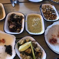 Selection of our food including polenta mushrooms, Dhal, aubergine, coconut pancakes and chickpeas. Yum  at The Coconut Tree in Bristol