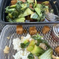 Bean curd and baby bok choy over white ricee  at Cravings Deli in Portage