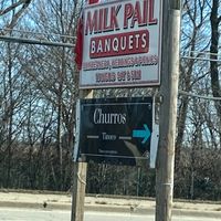 Here’s the sign on the road at Churros Tinoco in East Dundee