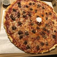 Impossible pizza with jalapeños on the side at Hungry Like The Wolf in Hoboken