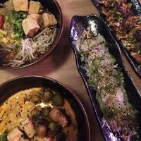 Two ramen bowl with gyoza (with BBQ sauce) and red beetroot with radish sauce at Kokomo Noodle Club in Hamburg