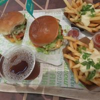 2 burgers and cheese fries at Vedang - green burger | Alexa in Berlin