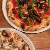 Vegan pizza (top) and a Bismarck with mushrooms instead of ham. at 808 Monsmare in Hakone