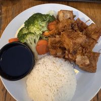 Stir fry tofu in onion. A gentle flavour of a type of soy sauce.   at Thèm in Docklands