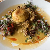 Chorizo and grits  at Watercourse Foods in Denver