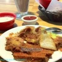 Buffalo wings, onion rings and chocolate shake.  at Watercourse Foods in Denver