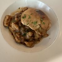 Chicken and biscuits with gravy   at Watercourse Foods in Denver