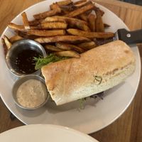 Turkey and Brie sandwich with jam, fries with aioli   at Watercourse Foods in Denver