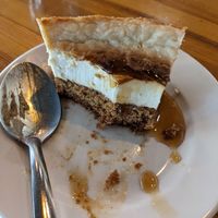 Half eaten cheesecake/carrot cake at Watercourse Foods in Denver
