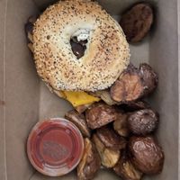 Ordered delivery to our hotel. Great “bacon” on the breakfast sandwich!   at Watercourse Foods in Denver